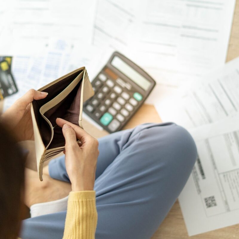 Checking wallet for alimony payment money | New Direction Family Law