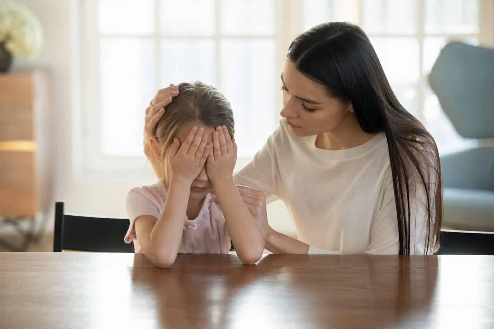 Woman-Comforting-Child | New Direction Family Law