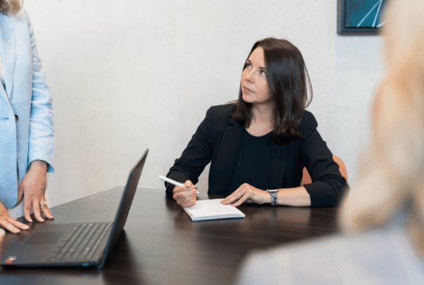 Attorney Sara Bolasny taking notes