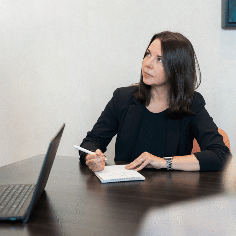 Attorney Sara Bolasny taking notes